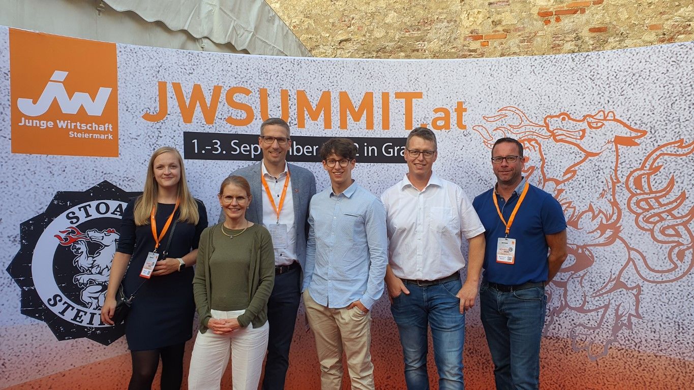 Group photo of the leadership team at the JW Summit 2022