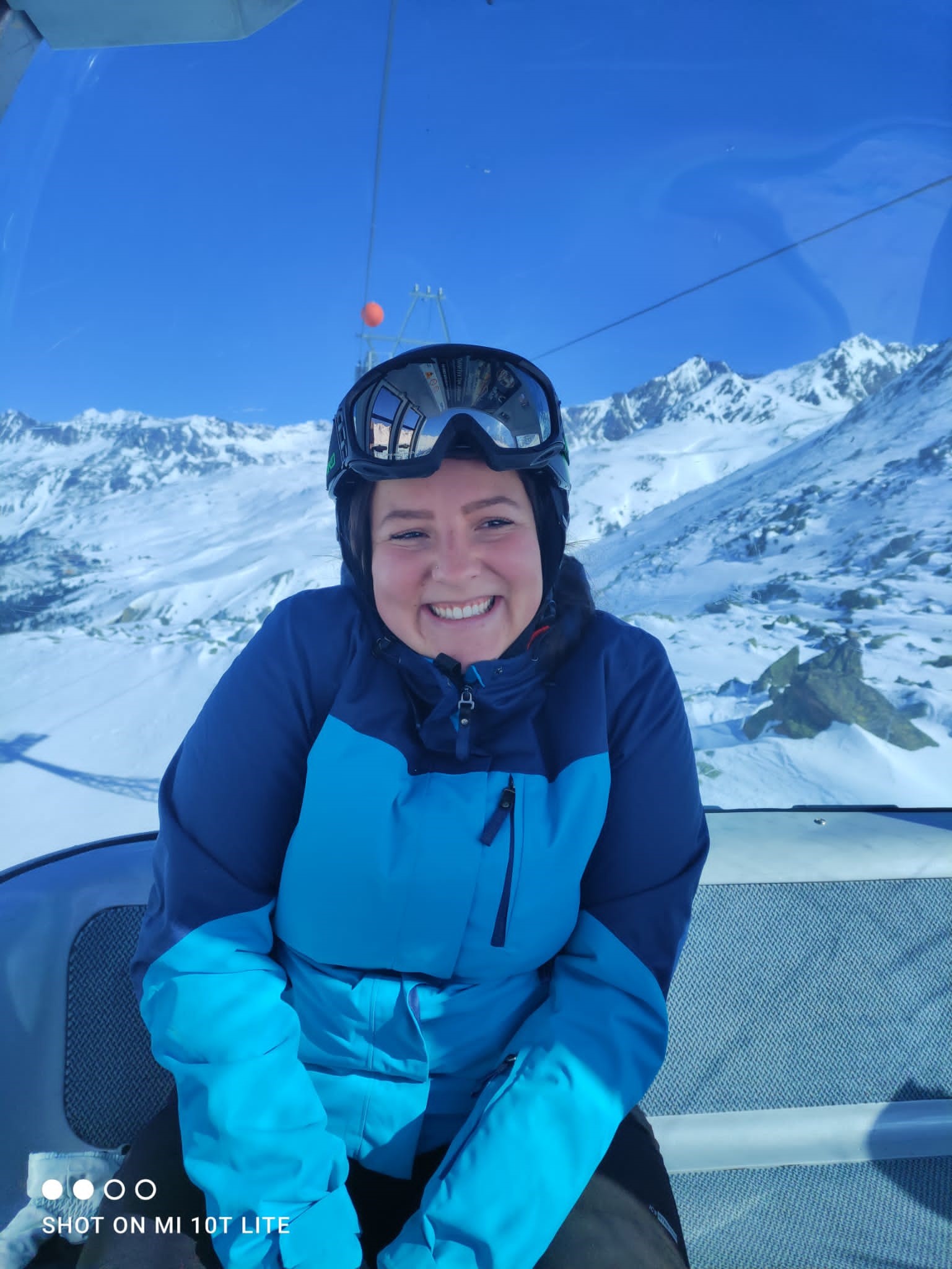 Chantal in a ski suit in the gondola